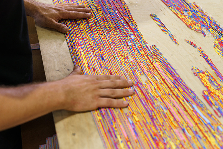 Beltrán Composing a Painting by Arranging Strips of Paint